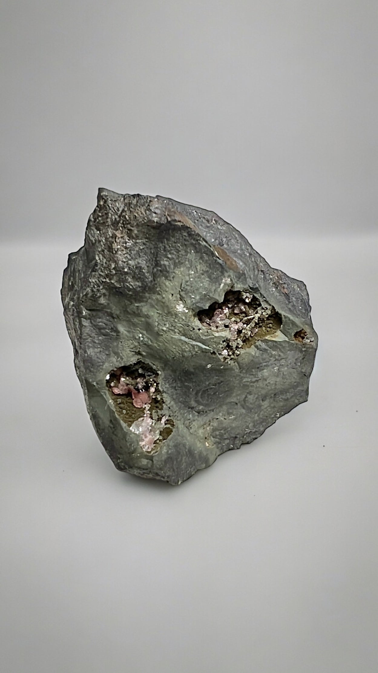 Raw Rhodochrosite with matrix